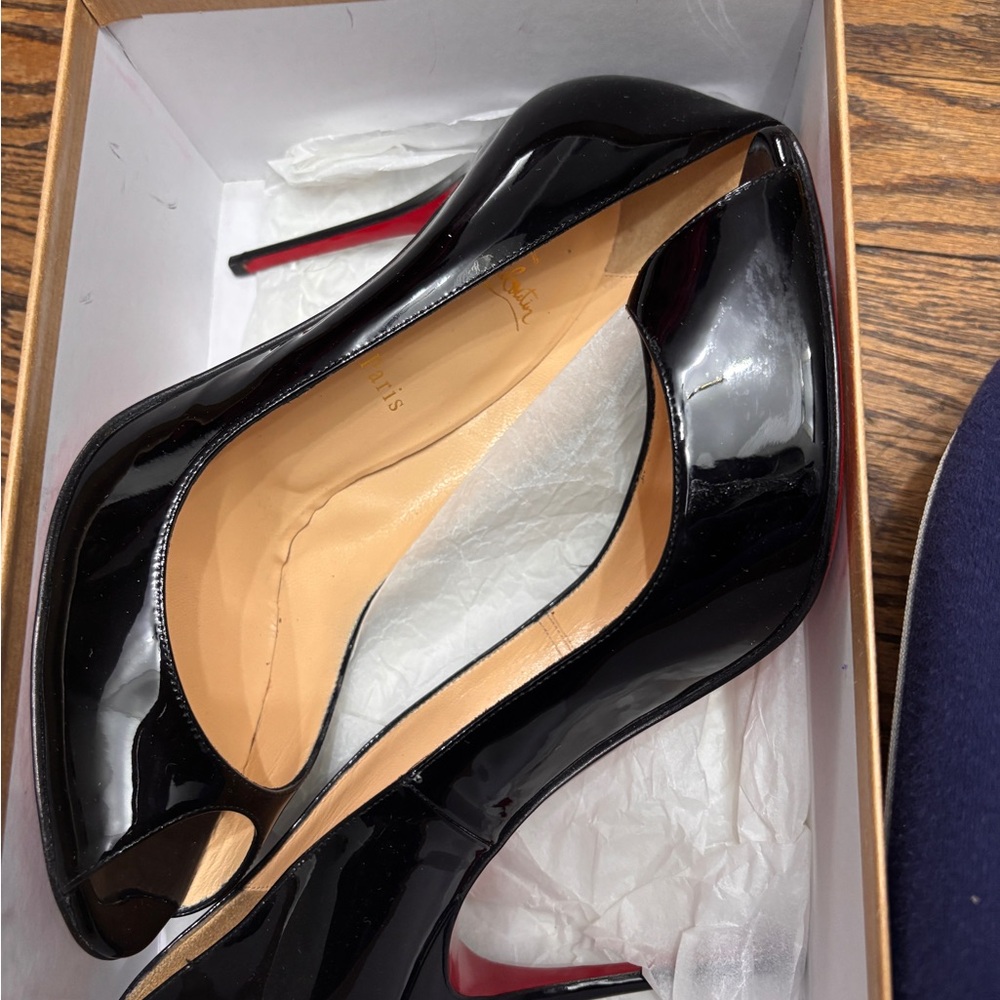 Christian Louboutin Black and Red Heels with Stiletto Design